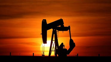 An oil pump of IPC Petroleum France is seen at sunset outside Sommesous, near Reims, France, on February 28, 2022. (Reuters)