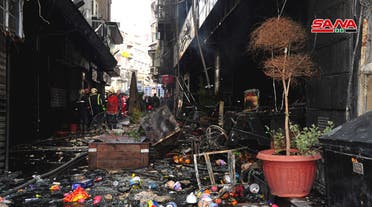 Photo shows fire fighters at La Mirada Mall where a fire broke out on 1 March, 2022. (SANA)