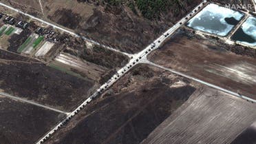 This Maxar satellite image taken and released on February 28, 2022 shows a military convoy along a highway, north of Ivankiv, Ukraine. According to imagery collected by Maxar, the large military convoy seen north of Kyiv stretches from near Antonov airport in the south to the northern-end of the convoy near Prybirsk. (AFP)