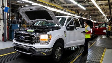 An assembly worker of Ford Motor works on an F-series pickup truck at the Dearborn Truck Plant in Dearborn, Michigan, US, on January 26, 2022. (Reuters)