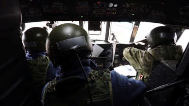 View of inside a Russian Army aviation helicopter as it escorts units of Russian Armed Forces in Ukraine, during their invasion, at in unspecified location in this screengrab obtained from social media, March 2, 2022. Russian Defence Ministry/Handout via REUTERS THIS IMAGE HAS BEEN SUPPLIED BY A THIRD PARTY. NO RESALES. NO ARCHIVES