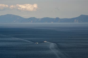  أرخبيل الكوريل المتنازع عليه يظهر في صورة ملتقطة من جزيرة هوكايدو اليابانية (أرشيفية)
