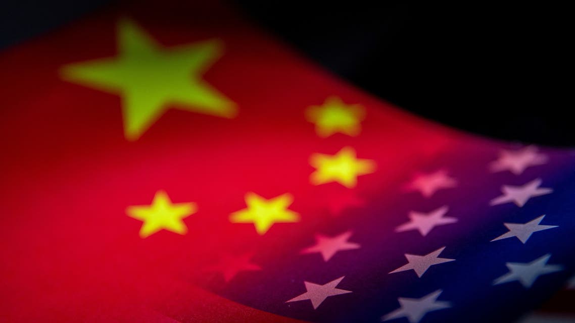 China and US flags are seen printed on paper in this illustration taken January 27, 2022. (Reuters)