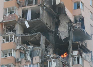 A view shows an apartment building damaged by recent shelling in Kyiv, Ukraine February 26, 2022. (Reuters)