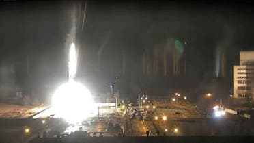 Surveillance camera footage shows a flare landing at the Zaporizhzhia nuclear power plant, March 4, 2022. (Reuters)