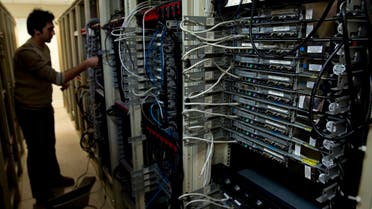 A computer engineer checks equipment at an internet service provider in Tehran February 15, 2011. (Reuters)