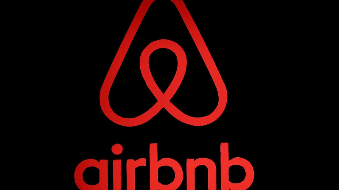 The logo of Airbnb is displayed at an Airbnb event in Tokyo, Japan, June 14, 2018. (Reuters)