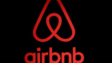 The logo of Airbnb is displayed at an Airbnb event in Tokyo, Japan, June 14, 2018. (Reuters)