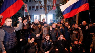 Members of the motorcycling club Night Wolves pose for a picture during a solidarity rally with their Russian brothers whom they support in their ongoing invasion of Ukraine, in Podgorica, Montenegro, March 2, 2022. (Reuters)