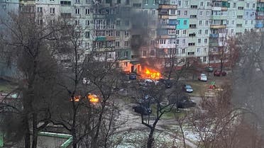Fire is seen in Mariupol at a residential area after shelling amid Russia's invasion of Ukraine, on March 3, 2022, in this image obtained from social media. (Reuters)