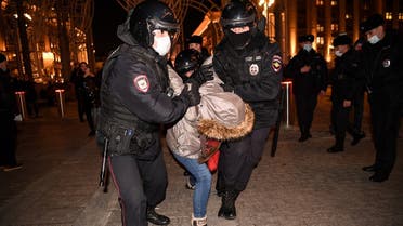 Police officers detain a person during a protest against Russia’s invasion of Ukraine in central Moscow on March 3, 2022. (AFP)