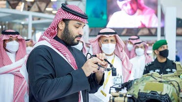 Crown Prince Mohammed bin Salman inspects military technology at the first World Defense Show outside of Riyadh on March 6 2022. (SPA)