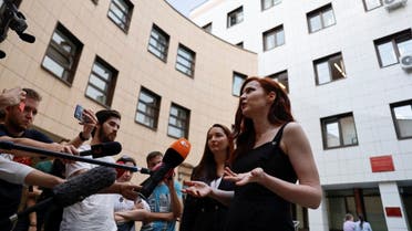 Kremlin critic Alexei Navalny's spokesperson Kira Yarmysh accused of breaching COVID-19 safety regulations speaks with journalists after a court hearing in Moscow, Russia, on August 16, 2021. (Reuters)