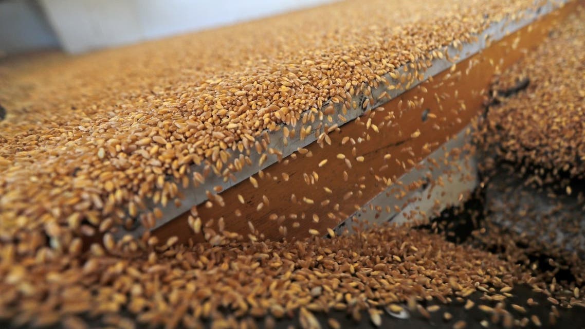 In this file photo taken on July 15, 2020 Wheat groats are milled during bulgur preparation in the Lebanese southern town of Marjayoun. (AFP)