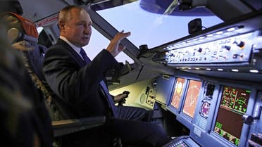 Russian President Vladimir Putin gestures during his visit to Aeroflot aviation training complex outside Moscow on March 5, 2022. (Sputnik/AFP)