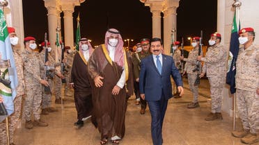 Saudi Arabia's deputy defense minister Prince Khalid (left) and Iraq's Minister of defense Jumaa al-Jubouri (right). (twitter)