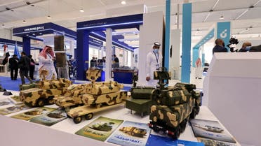 Saudi men are seen looking at Russian defence system models on display at World Defense Show in Riyadh, Saudi Arabia, March 6, 2022. REUTERS/Ahmed Yosri