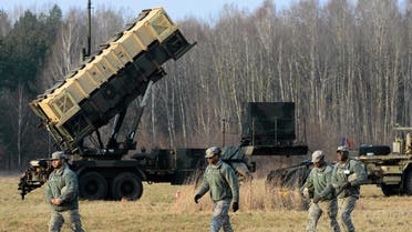 US soldiers walk next to a Patriot missile defense battery near Warsaw. (File Photo: Reuters)