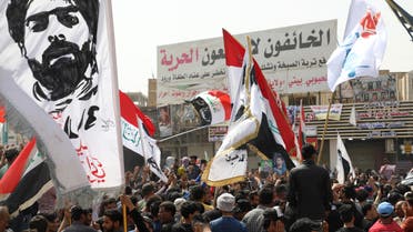 Iraqis demonstrate to denounce rising prices of basic food items, in al-Haboubi Square in the centre of Iraq's city of Nasiriyah in the southern Dhi Qar province on March 9, 2022. (AFP)