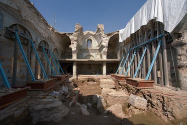 من أعمال التجديد لكنيسة الطاهرة للسريان الكاثوليك في المدينة القديمة بالموصل - فرانس برس 