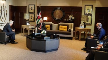 Jordan's King Abdullah II meets with Israeli Foreign Minister Yair Lapid in Amman, Jordan March 10, 2022. (Jordanian Royal Palace/Handout via Reuters)