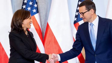 Polish Prime Minister Mateusz Morawiecki greets U.S. Vice President Kamala Harris as she arrives for a meeting in Warsaw, Poland March 10, 2022. (Reuters)