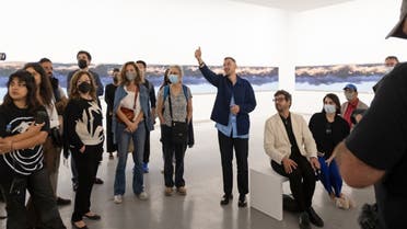 Lawrence Abu Hamdan giving a tour of his new work, Air Conditioning (2022), commissioned by Sharjah Art Foundation, at the opening of 'The Sonic Image'. (Sharjah Art Foundation, 2022. Photo: Shanavas Jamaluddin)