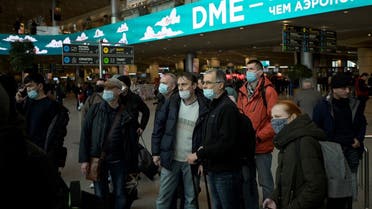Passengers are seen at Moscow's Domodedovo airport - the base of Russian carrier S7 - on March 5, 2022, the day S7 Airlines cancelled all its international flights due to sanctions imposed on Russia over the country's invasion of Ukraine. (AFP)