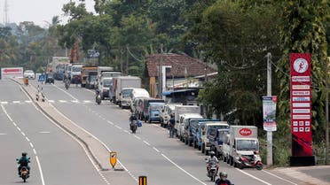Diesel vehicles queue up to buy diesel on a main road near a Ceylon Petroleum Corporation fuel station in a suburb of Colombo, Sri Lanka March 3, 2022. (Reuters)