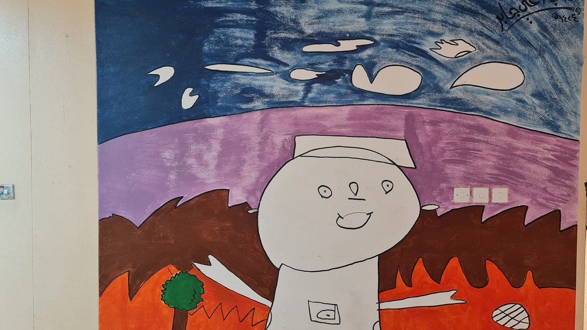 لوحة لطفل من ذوي الاحتياجات الخاصة تتحول لجدارية.. وهذه قصتها