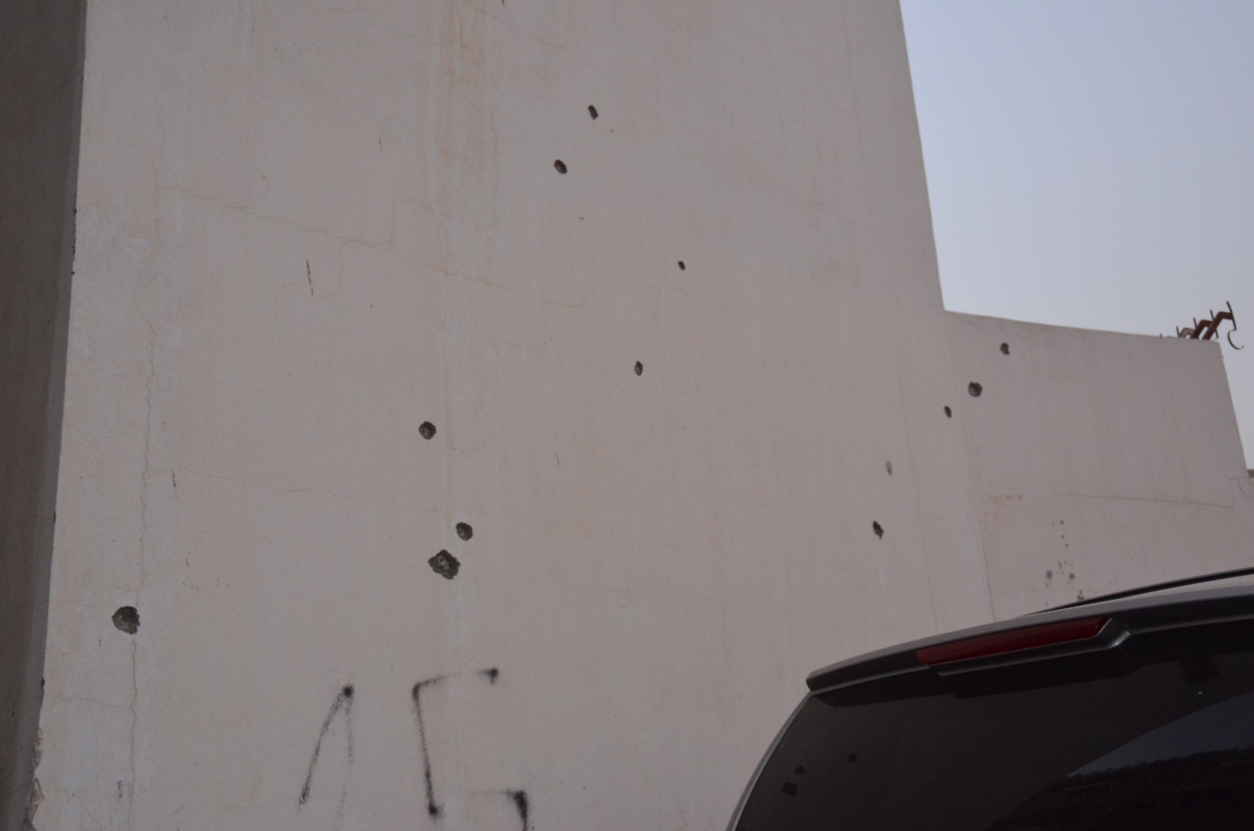 Random gunshots on the walls of the aggressors