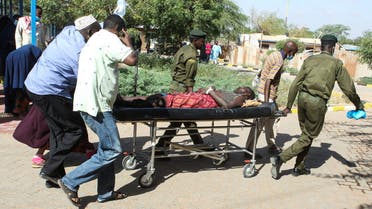 A man is wheeled on a stretcher after he was injured when their public service vehicle hit an Improvised Explosive Device (IED) near the Kenya-Somalia border in Mandera county, Kenya January 31, 2022. (Reuters)