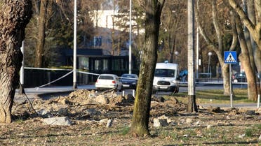 This picture taken on March 11, 2022 shows a crater on the ground after a flying object crashed overnight on the outskirts of the Croatian capital, Zagreb. (AFP)