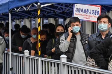 طابور لإجراء اختبار في شنغهاي يوم 11 مارس (فرانس برس)