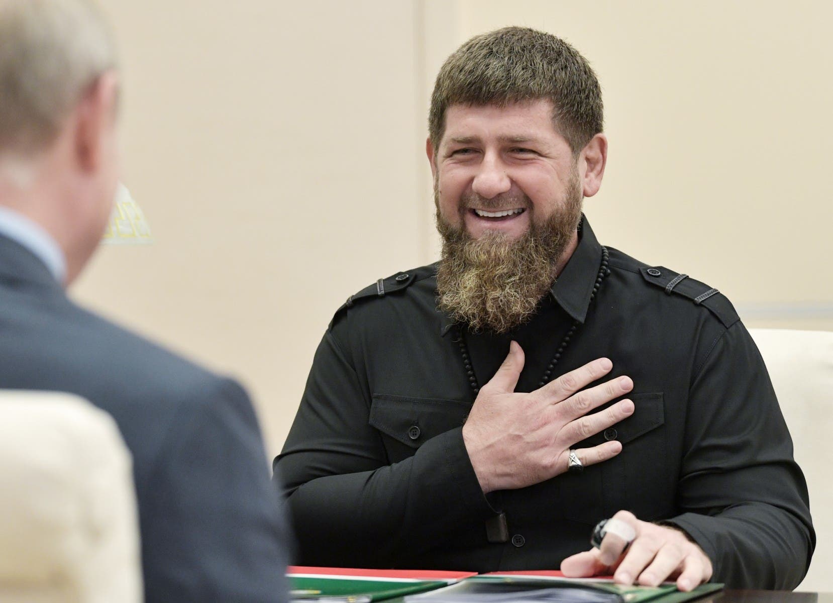 زعيم الشيشان رمضان قديروف مقابلا بوتين(أرشيفية- فرانس برس)