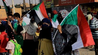 Protesters march across Sudan as economy spirals