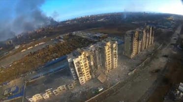  An aerial view shows damaged residential buildings, amid Russia’s invasion of Ukraine, in Mariupol, Ukraine on March 14, 2022 in this still image taken from a drone footage obtained from social media. (Reuters)