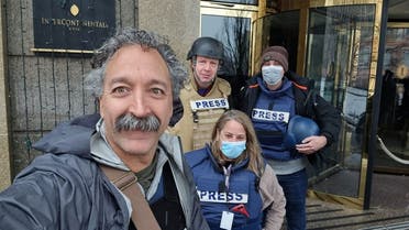  This undated image courtesy of Fox News shows cameraman Pierre Zakrzewski (left) posing with colleagues at the Kyiv Intercontinental Hotel. (AFP)