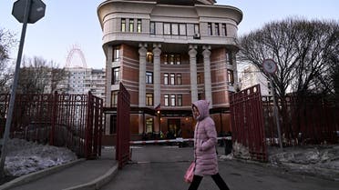 A woman walks past the Ostankinsky District Court where the editor at state broadcaster Channel One who protested against Russia’s invasion of Ukraine. (File Photo: Reuters)