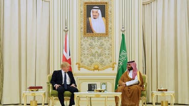 British Prime Minister Boris Johnson speaks with Saudi Crown Prince Mohammed bin Salman ahead of a meeting at the Royal Court, during a one-day visit to Saudi Arabia and the UAE. (Reuters)