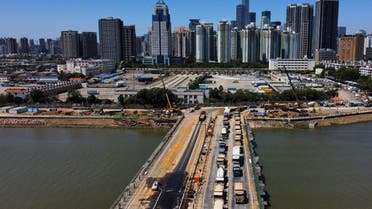 A general view shows a temporary bridge from Shenzhen to Hong Kong for transporting materials and workers to build a coronavirus disease (COVID-19) isolation facility in Lok Ma Chau, during the COVID-19 pandemic in Hong Kong, China, on March 9, 2022. (Reuters)
