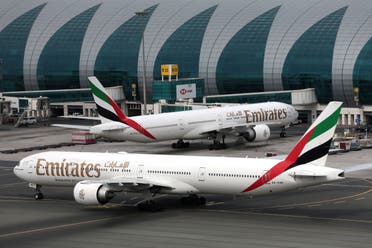 Emirates Airline Boeing 777-300ER planes are seen at Dubai International Airport in Dubai, United Arab Emirates February 15, 2019. (Reuters)