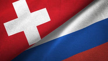 Russia and Switzerland two flags together realations textile cloth fabric texture stock photo