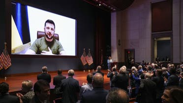 Ukrainian President Volodymyr Zelensky virtually addresses the US Congress on March 16, 2022, at the US Capitol Visitor Center Congressional Auditorium, in Washington, DC. (AFP)