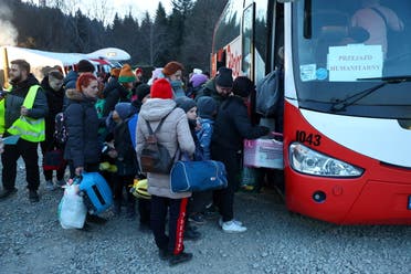 لاجئون أوكرانيون في بولندا - رويترز