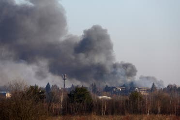 Smoke rises from a factory building near Lviv airport, as Russia's invasion of Ukraine continues, in Lviv, Ukraine, March 18, 2022. (File photo: Reuters)
