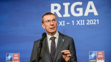 Latvia’s Foreign Minister Edgars Rinkevics gives a doorstep press statement during a meeting of NATO foreign ministers in Riga, Latvia on November 30, 2021. (AFP)
