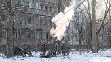 Service members fire a mortar launcher during tactical exercises, which are conducted by the Ukrainian National Guard, Armed Forces, special operations units and simulate a crisis situation in an urban settlement, in the abandoned city of Pripyat near the Chernobyl Nuclear Power Plant, Ukraine February 4, 2022. (Reuters)