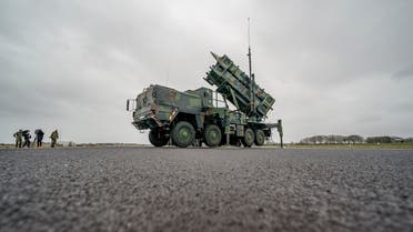 Ready-for-combat Patriot anti-aircraft missile systems of the German forces Bundeswehr's anti-aircraft missile squadron 1 stand on the airfield of military airport during a media presentation in Schwesing, Germany, Thursday, March 17, 2022. Some units of the squadron are already on their way to Slovakia to reinforce NATO's eastern flank. (Axel Heimken/dpa via AP)