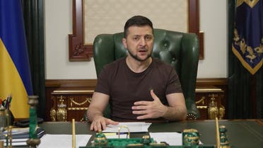 In this handout picture taken on March 20, 2022 and released by the Ukrainian Presidency Press Office, Ukrainian President Volodymyr Zelensky delivers a video address in Kyiv. (AFP)